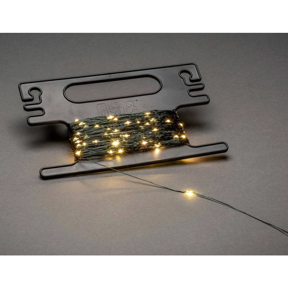 Konstsmide 6460-830 Mikro svjetlosni lanac Kapi Vani ATT.CALC.EEK: LED strujni pogon LED Jantarna boja Osvjetljena duljina: 19.8 slika